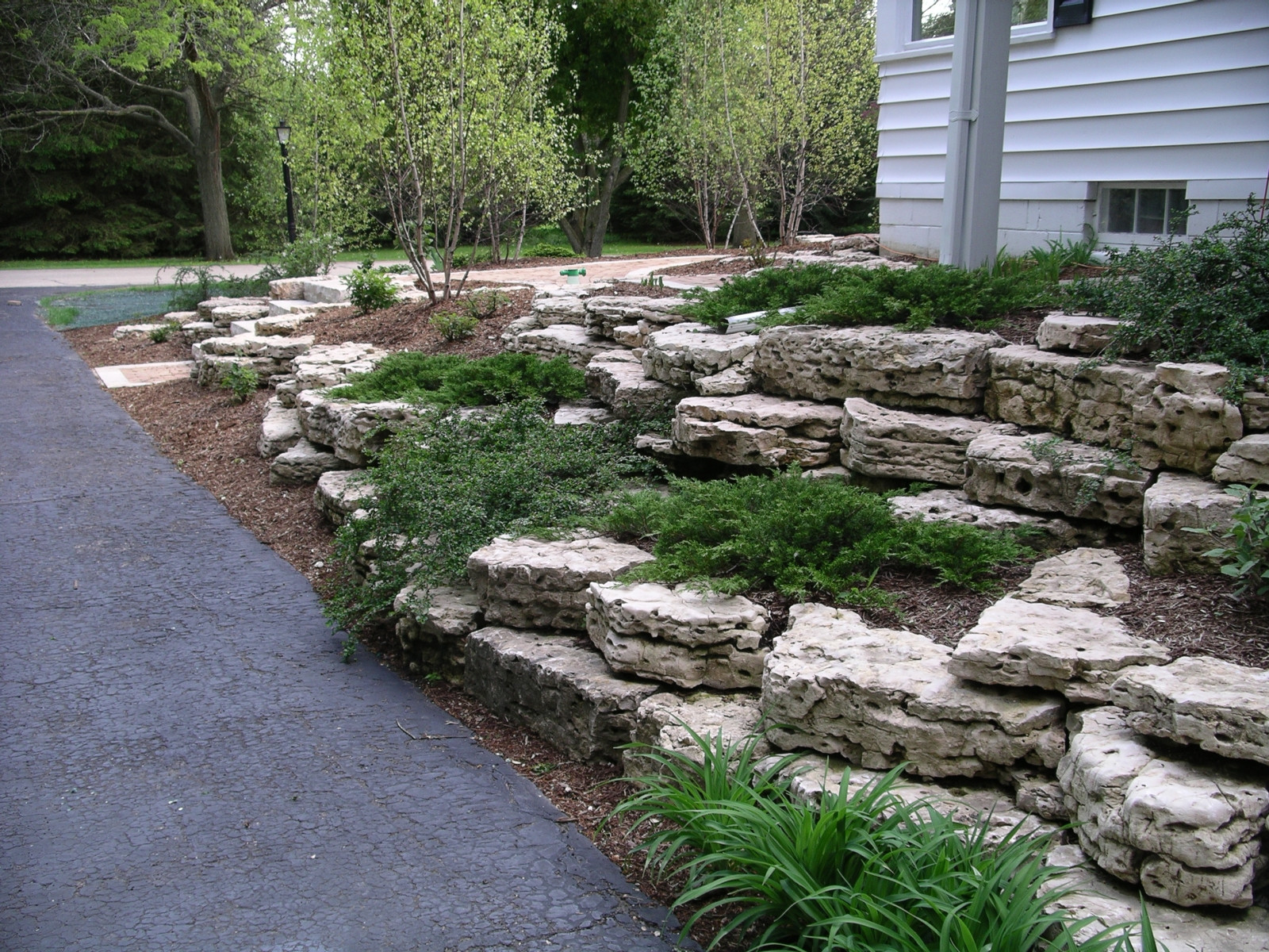 Retaining Walls and Outcroppings - Treetops Landscape ...