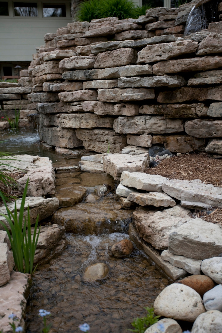 Retaining wall with water feature in Mequon, WI